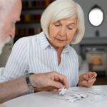 Seniors playing board games in retirement