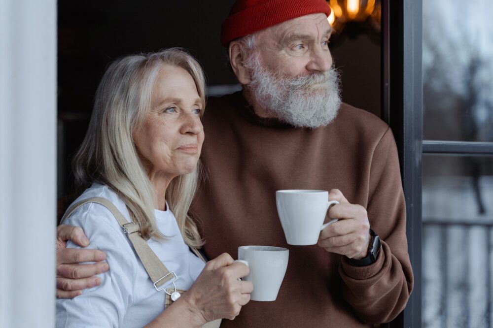 image of two seniors drinking coffee